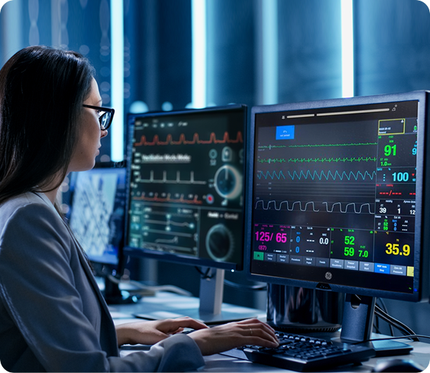 Four colleagues brainstorming at dark office